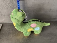 Kind Dinosaurier Stofftier