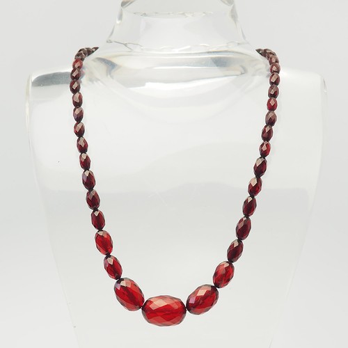 Antique faceted cherry amber