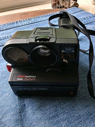 Polaroid land camera sonar - camera,