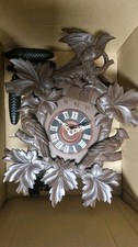 Wanduhr mit Gewichten für