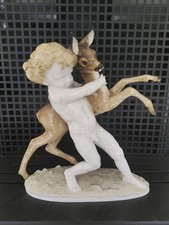 Porzellanfigur Putto mit