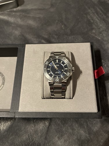 Oris aquis date - date, uhr