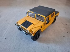 Hummer H1 Soft Top, gelb, 1:18, Maisto