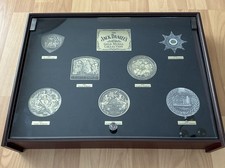 Jack Daniels Gold Medal Collection, 7 medals in timber display case