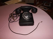 Altes Telefon mit Wählscheibe von Siemens, schwarz, gebraucht