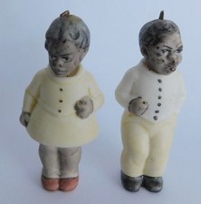 2 kleine alte Ganzkörper