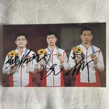 Ma Long And Xu Xin And Fan