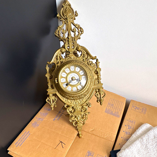 Wanduhr oval goldfarben
