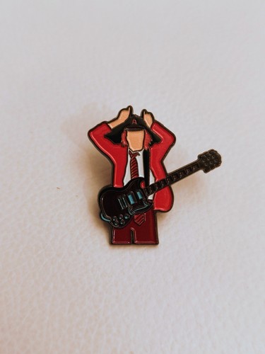 Angus young devil horns - ac/dc,