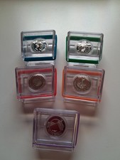 5 x 5 Euro Münzen in Plastikbox.