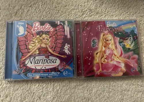 Barbie mariposa - +,