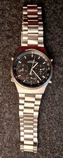 SEIKO Chronograph 7A38-7020 Quarz Armbanduhr, Silber mit schwarzen Ziffernblatt