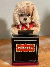 Jolly Pianist Dog Tin Toy