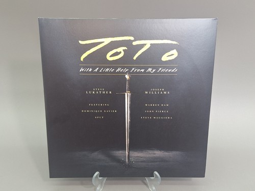 Toto with a little help - little,