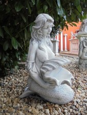 Steinfigur, Meerjungfrau mit