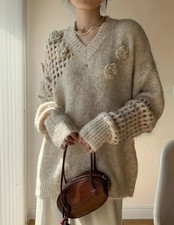 Eleganter 3D Blumenpullover