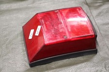 Rücklicht gebraucht Triom 220049 mit Fassung Gummi Schrauben Vespa PK 125