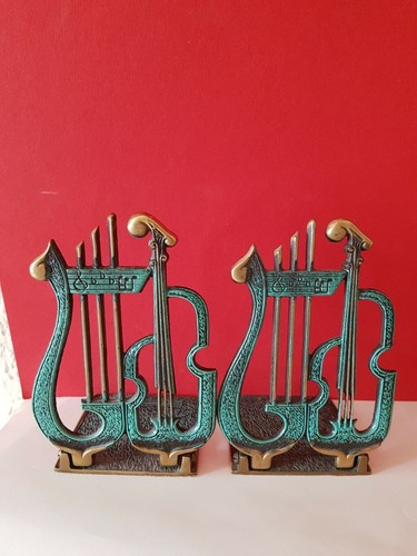 Buchstützen aus bronze - aus,