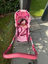 Puppenwagen mit Puppe, in Pink, sucht ein neues  Zuhause - guter Zustand