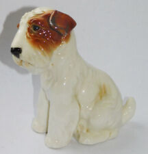 Porzellanfigur sitzender Hund