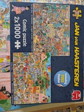Jumbo Puzzle 2*1000 Teile Jan van Haasteren Holiday Jitters / The Music Shop