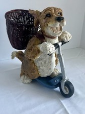 Vintage Ceramic Dog Riding