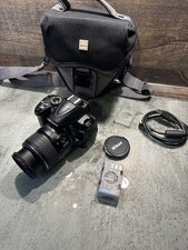 Nikon D3000 + 18-55mm Kit