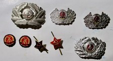 Konvolut DDR Uniform-Mützen-Kokarden / Militär ; Forstwirtschaft u.a.