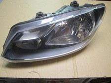 VW Caddy III Scheinwerfer links Hella 1EL010551-01 2K5941005A