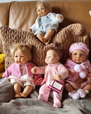 Künstlerpuppe Antonio Juan, Emma von Ashton Drake und 2 weitere Namenlose.