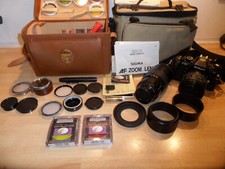 Alte Kamera Fotoapparat Nikon F-501 AF Objektiv Sigma AF Zoom Lens HTMC Filter