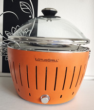 Lotus Grill classic Holzkohlegrill Tischgrill Orange mit Glasdeckel Brennpaste