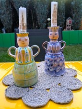 zwei figürliche Kerzenhalter