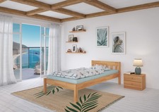 Überlanges Holzbett