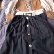 Trachtenrock schwarz Oberteil braunes Leder Rock Material  feiner fließendeStoff