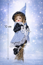 Hexe Puppe auf Besen –