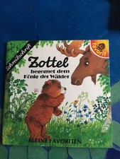 Kleine Favorit Verlag  - Zottel begegnet dem König der Wälder