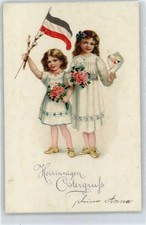 50352773 - Maedchen winken mit Fahne Ostern