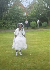 Weißes Kommunionkleid für