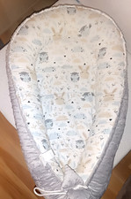 Kuschliges Babynest mit Wald-Tieren