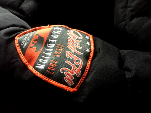 Kinderjacke schwarz orange