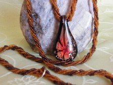 Perlenkette, mehrreihig, gedreht in braun mit Art Murano Glas Anhänger ca 96 cm