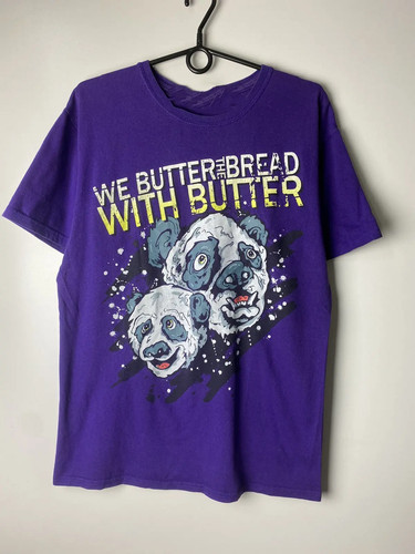 Rare butter the bread with - butter,