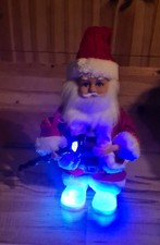 Laufender Weihnachtsmann mit Musik und Beleuchtet