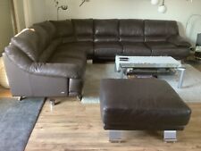 Ledercouch mit Rundecke + Hocker