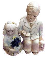 2 Alice Figuren - Mann mit Hund / Mädchen mit Blumem