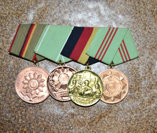DDR  Volkspolizei Polizei Ordensspange mit Medaillen