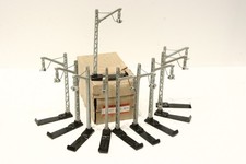 Märklin 407 MN, 10 Oberleitungsmasten, Guss, Arm schräg, sehr gut, OVP