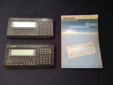 2 x Sharp Pocket Computer PC -E220 + Anleitung
