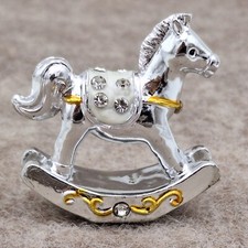 Schaukelpferd silber gold